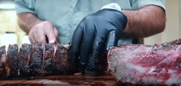 This photo shows how to slice a Porterhouse Steak