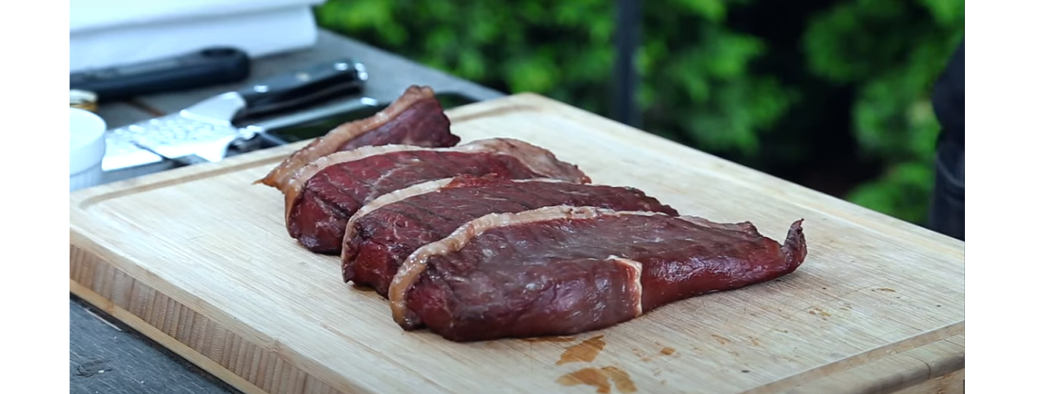 This image shows four slices of picanha steak