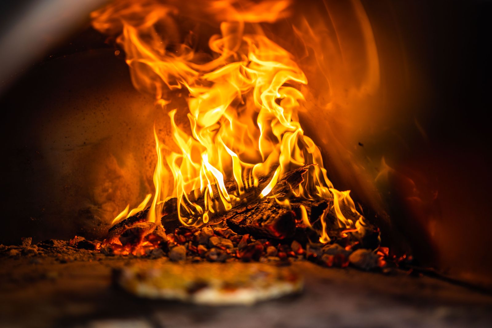 This image shows the wood fired pizza oven.