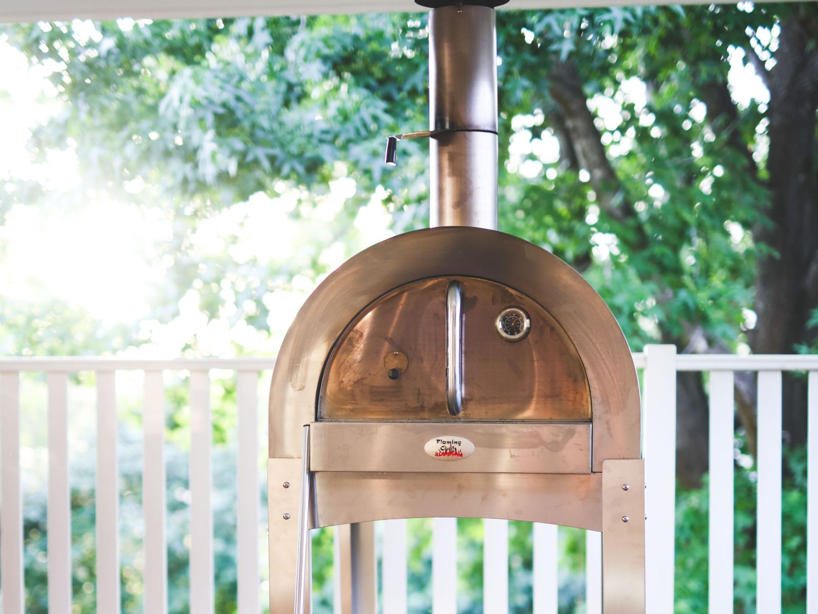 This_image_shows_a_pizza_oven_in_the_backyard