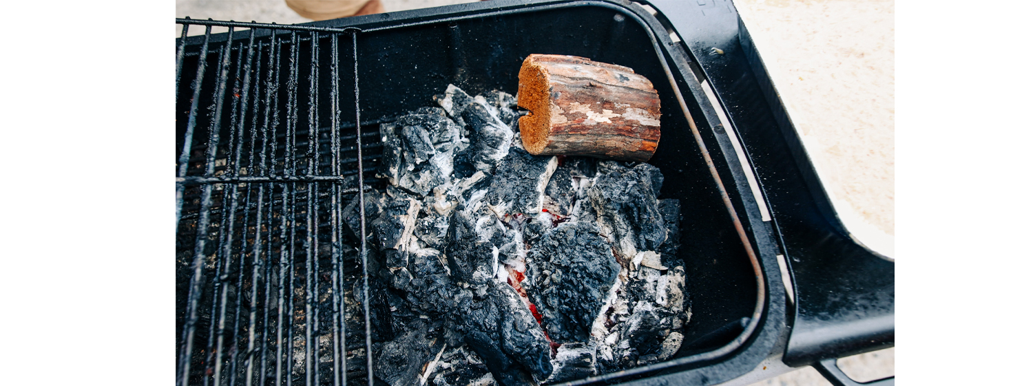 This image shows Pro Q Smoker with charcoal