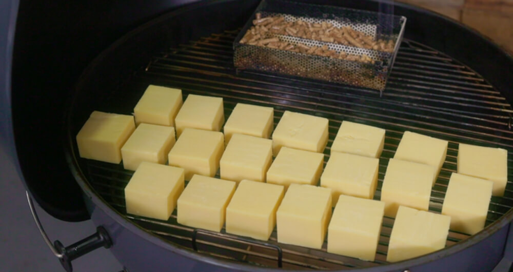 This_image_shows_smoking_tray_and_cheese_being_placed_on_SNS_kettle