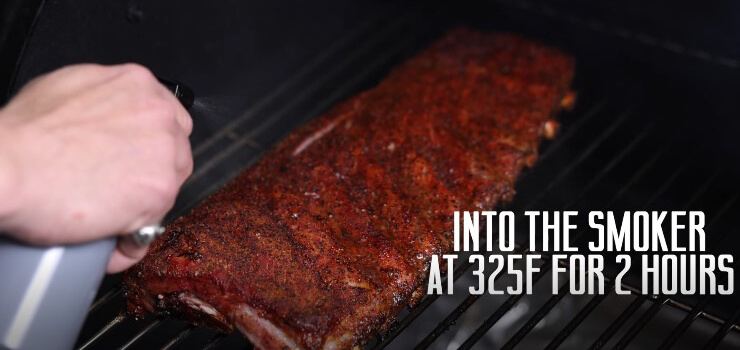 This photo shows how to put Pork Ribs on a Smoker