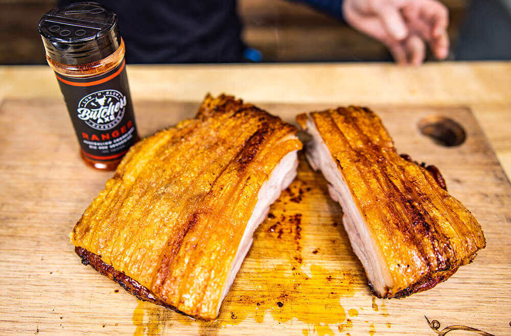 This image shows pork belly with Butcher Ranger Rub