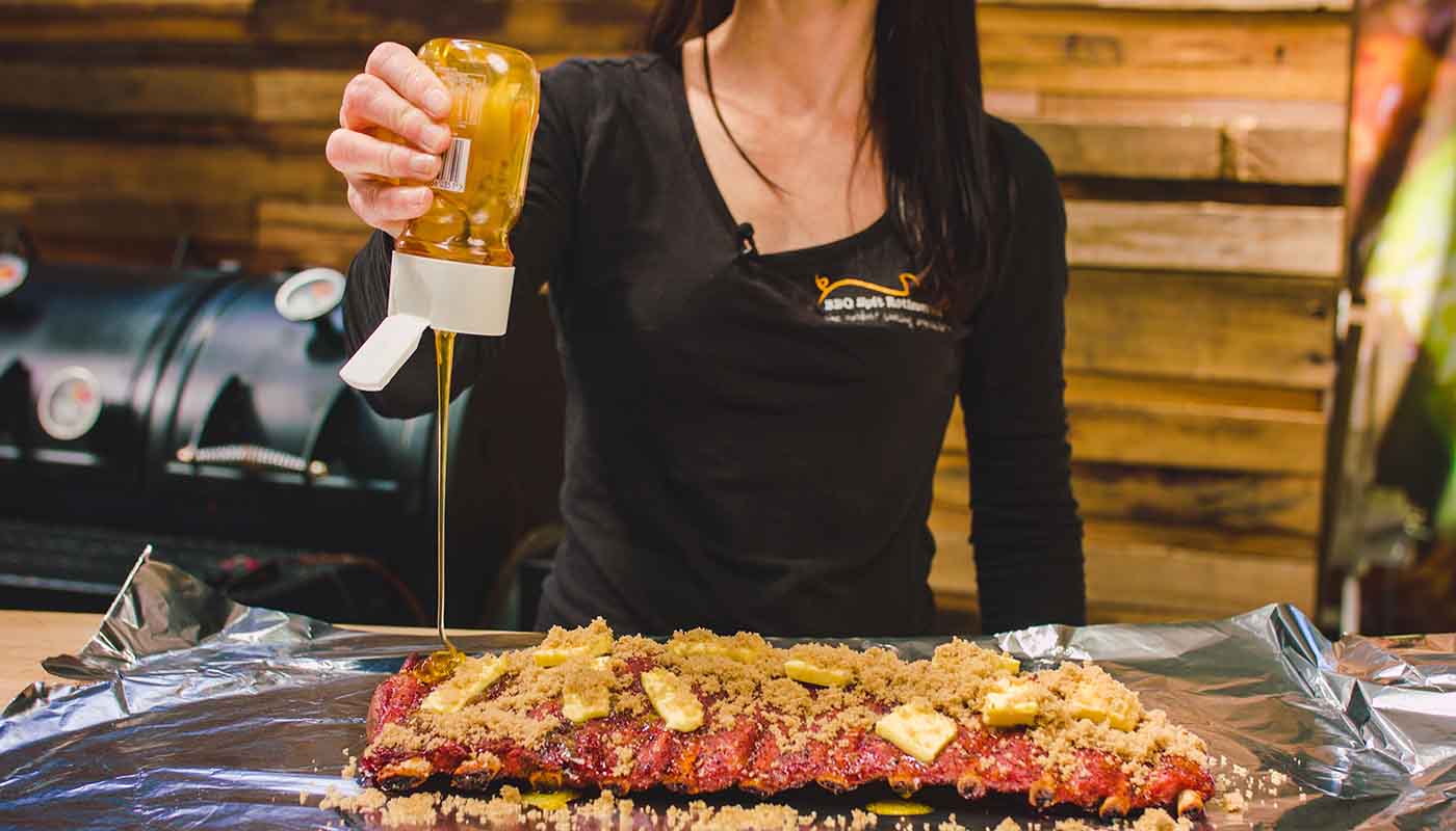 This image shows pork ribs with honey, butter and brown sugar