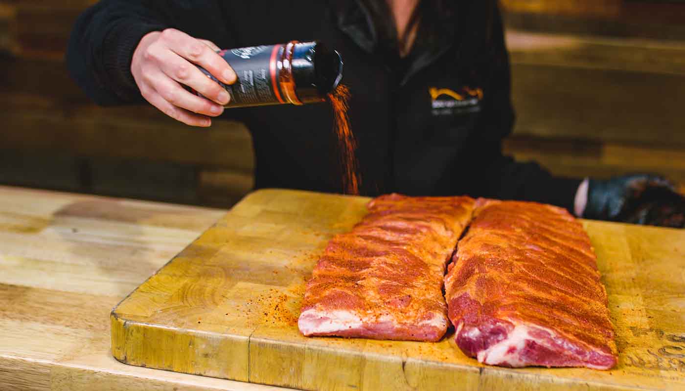 This image shows a pork ribs seasoned with Butcher's Axe Ranger Rub
