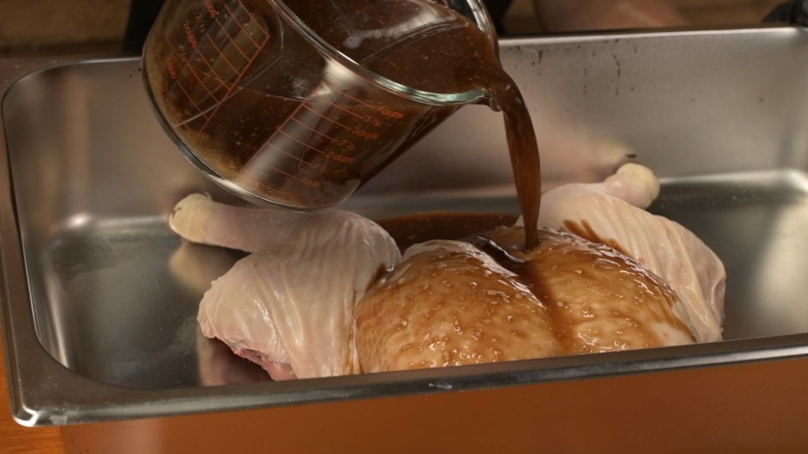 This_image_shows_the_chicken_being_marinated_in_the_zesty_marinade_mixture