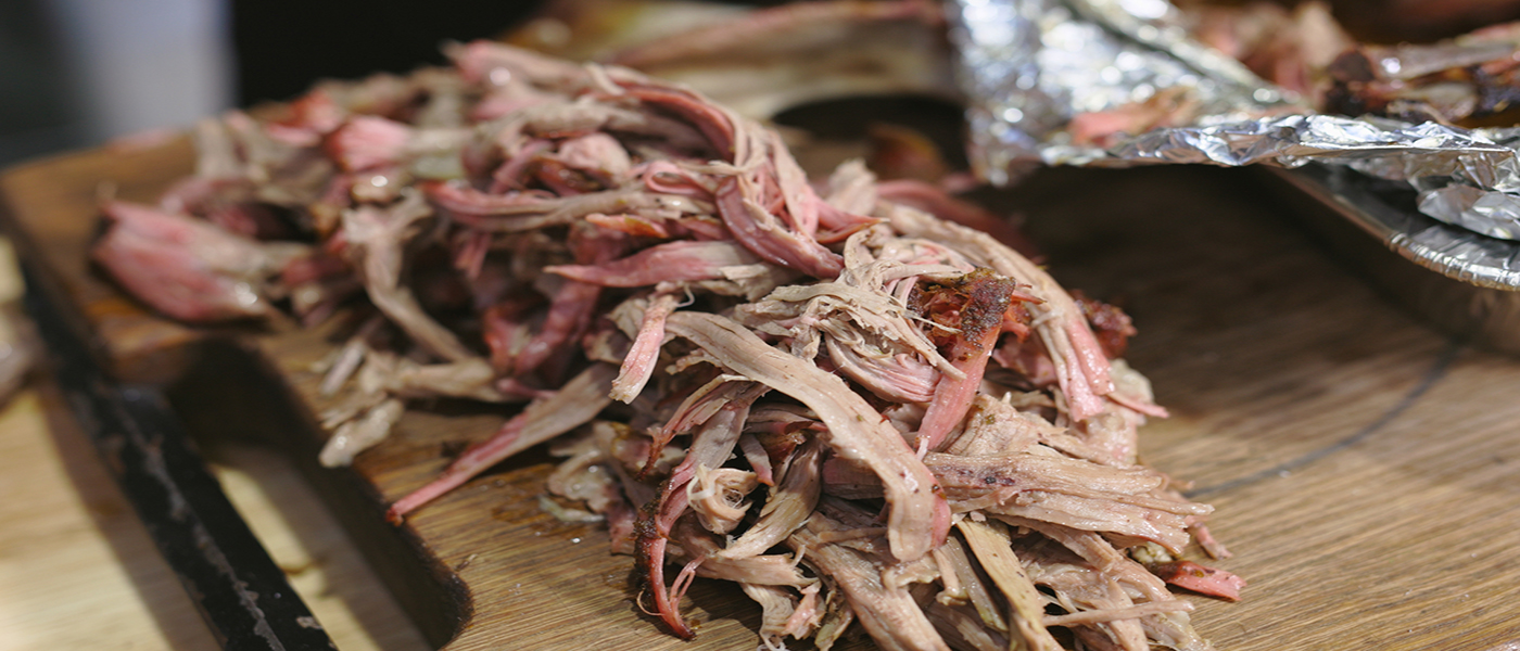 This image shows pulled lamb shoulder