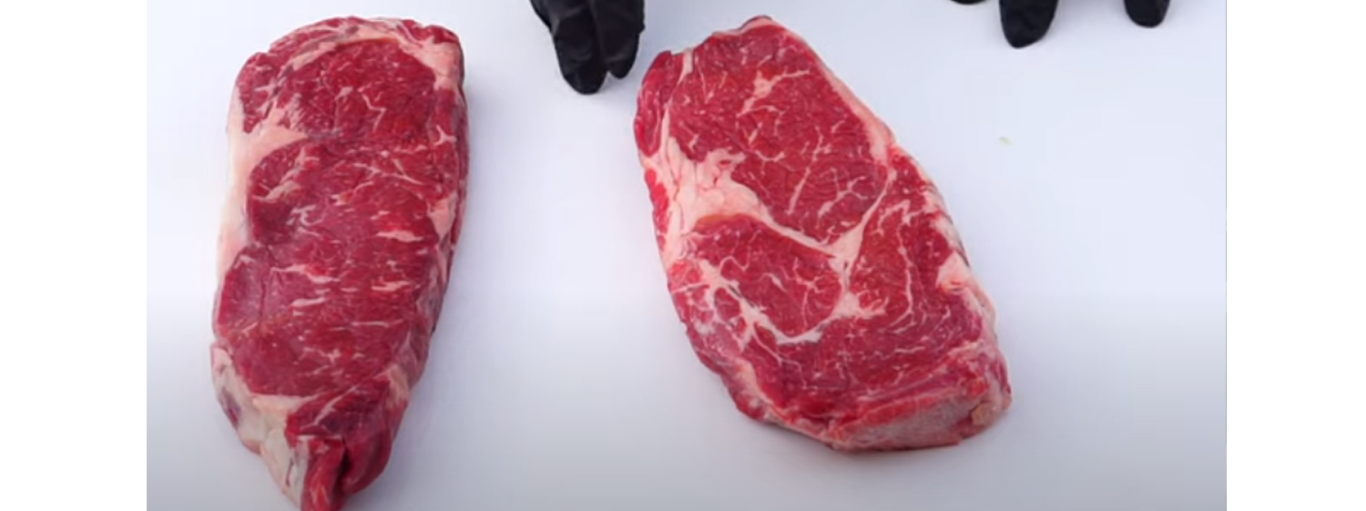 This image shows two pieces of Rib Eye Steak