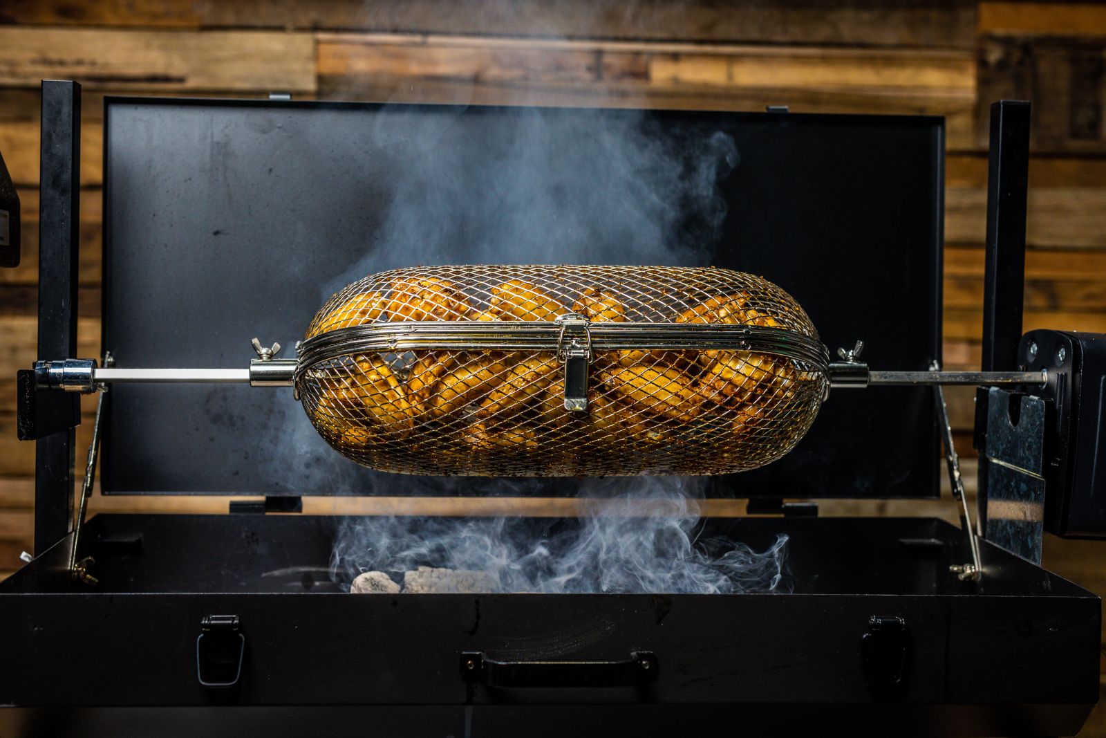 This image shows chicken wings cooked on Rotisserie Round Cage tumbler