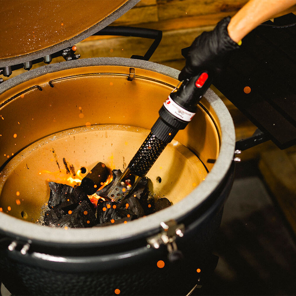 This_image_shows_lump_charcoal_being_lit_on_SNS_Kamado