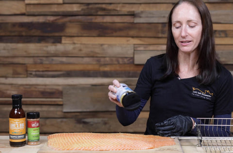 This image shows Salmon being seasoned with  Meat Graffiti ÔVandalÕ All purpose rub