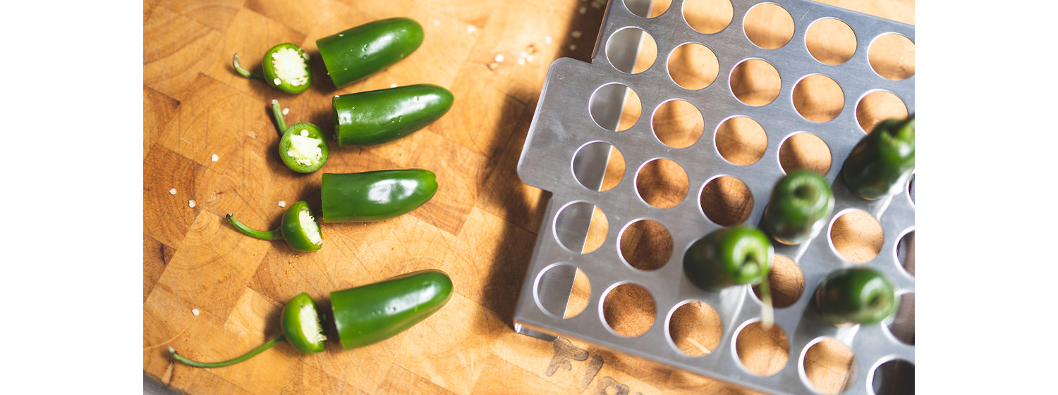 Scoop out the insides of jalapeno with a spoon