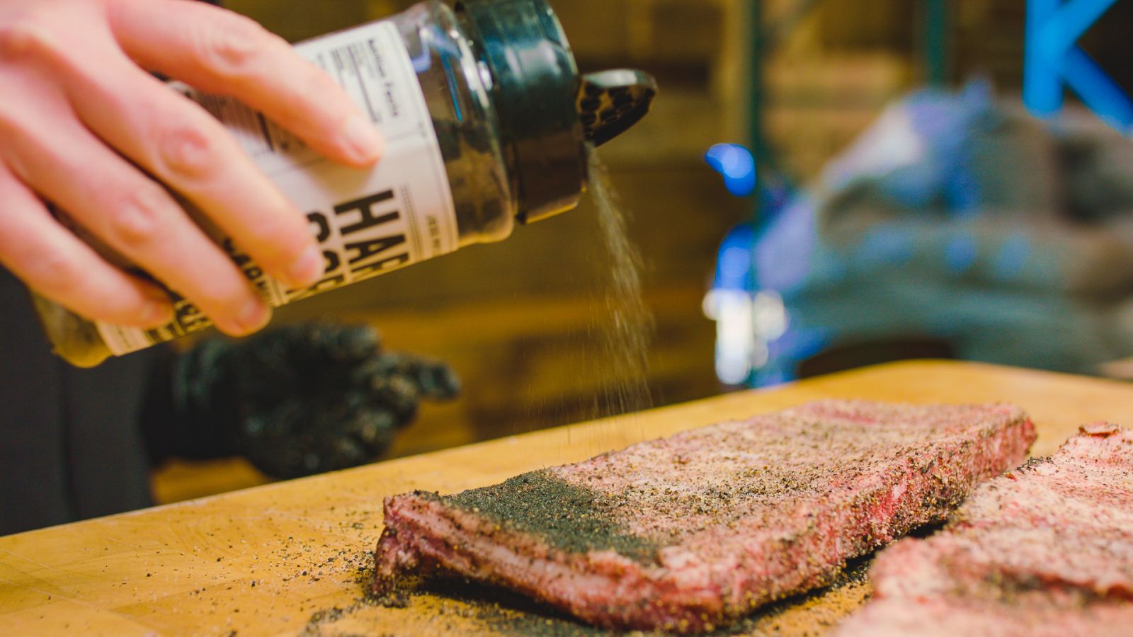 This image shows beef ribs seasoned with Hardcore Carnivore Rub