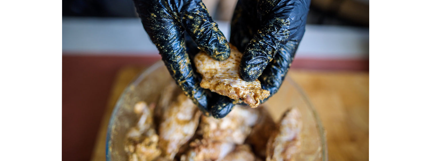 This image shows chicken wing in a bowl of slurry