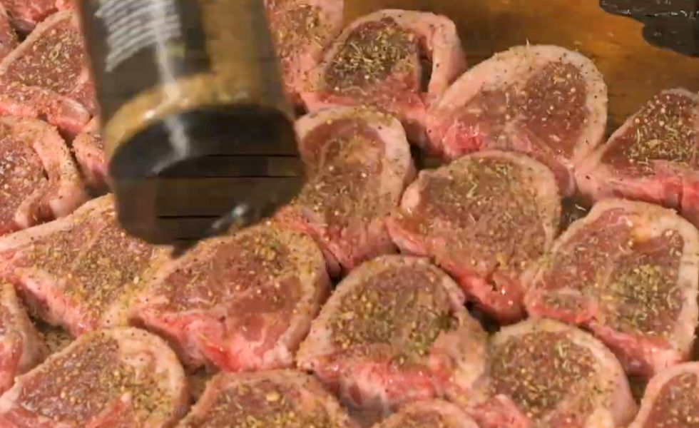 This image shows seasoned lamb loin chops