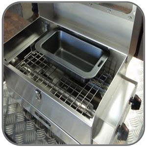 This image shows the cooking rack installed in a Sizzler BBQ