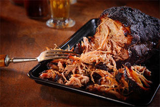 This is a picture of pork shoulder that was smoked to make Pulled Pork