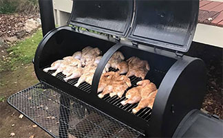 This image shows Raw chickens in an Offset Smoker