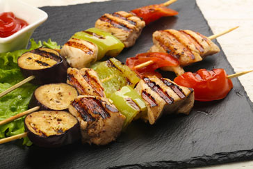 spit roasting chicken kebab