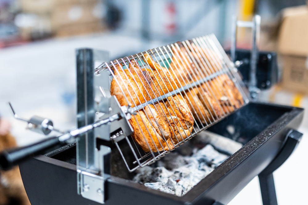 This image shows Spit Rotisserie Multi Use Basket - Large filled in action