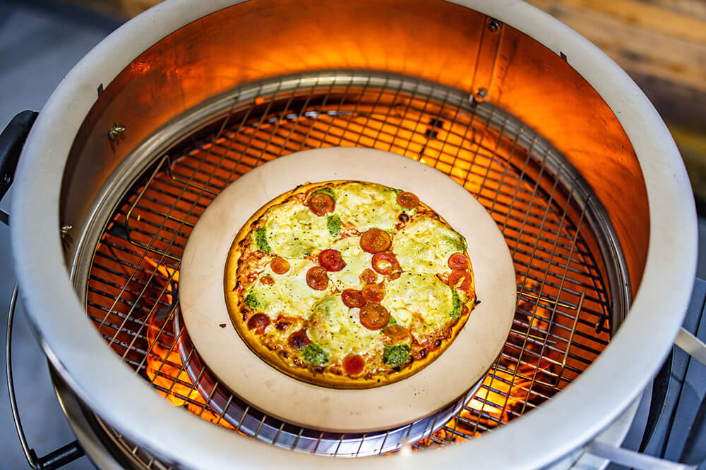 This_image_shows_Pizza_ring_being_used_in_cooking_pizza
