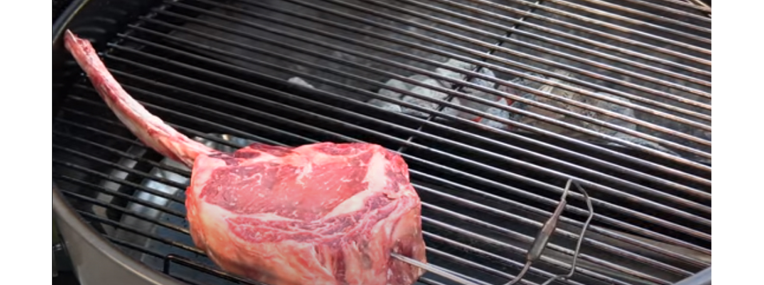 This image shows a Tomahawk on Kettle Grill