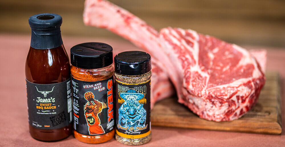 This_image_shows_tomahawk_steak_and_bbq_rubs_and_sauces