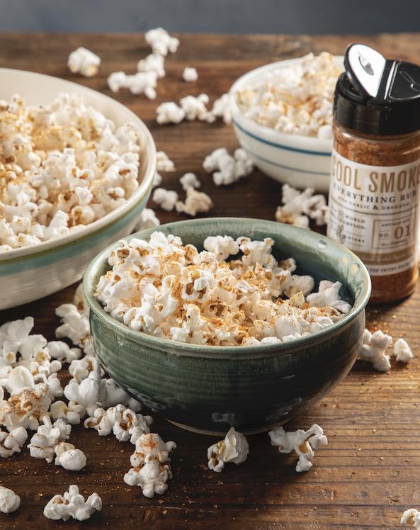this image shows a bowl of popcorn seasoned with Tuffy Stone Cool Smoke Everything Rub