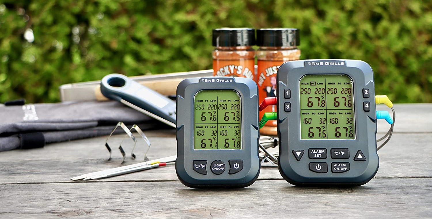 This image shows the SNS-500 wireless meat thermometer sitting on a bench before being used to measure temperatures in a smoker