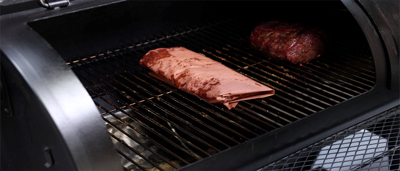 This image shows the wrapped pork rib on Flaming Coals Offset Smoker
