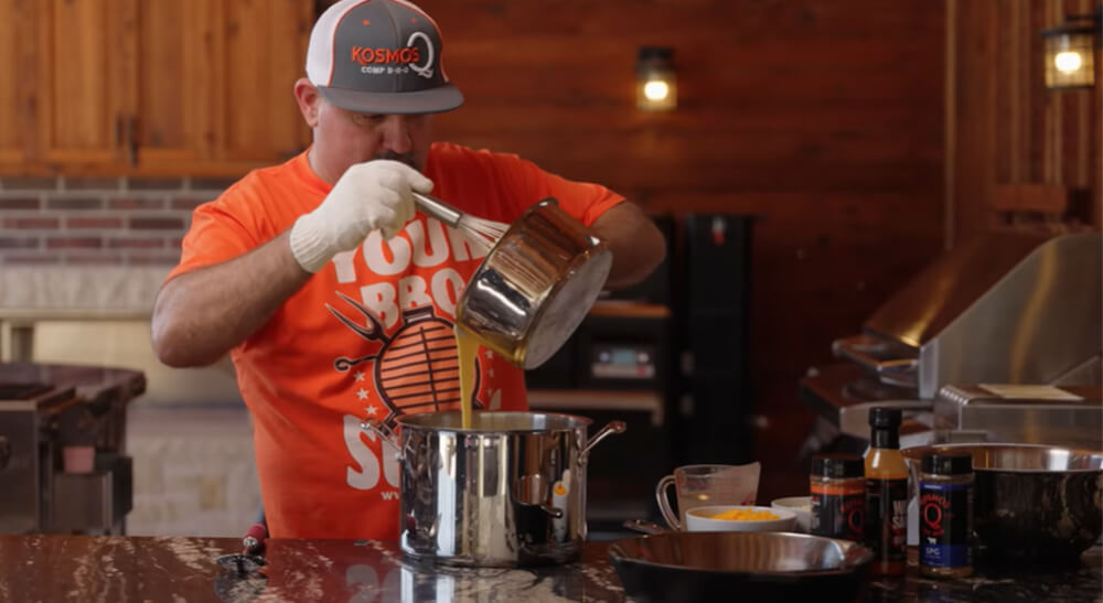 This image shows the cheese mixture being added to the pasta