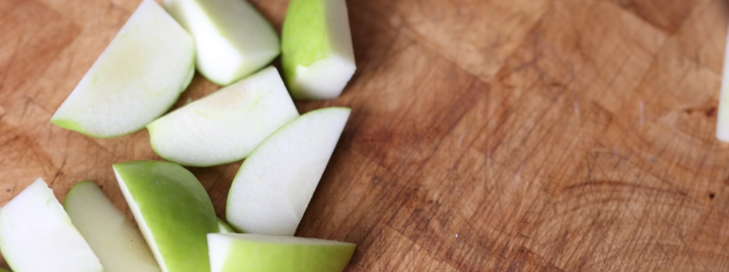 Cut your apple into quarters.
