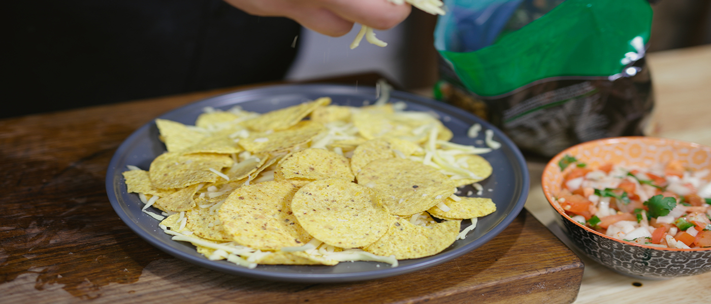 This image shows chips on a plate for Nachos Recipe