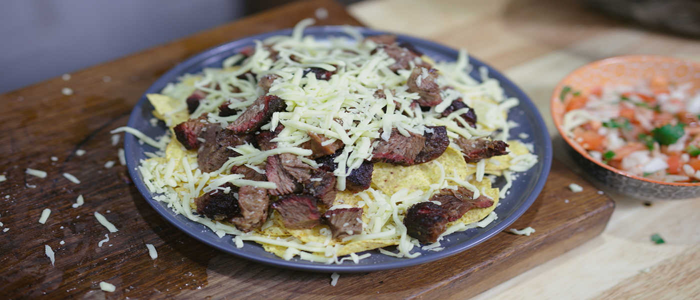 This image shows beef nachos on a plate