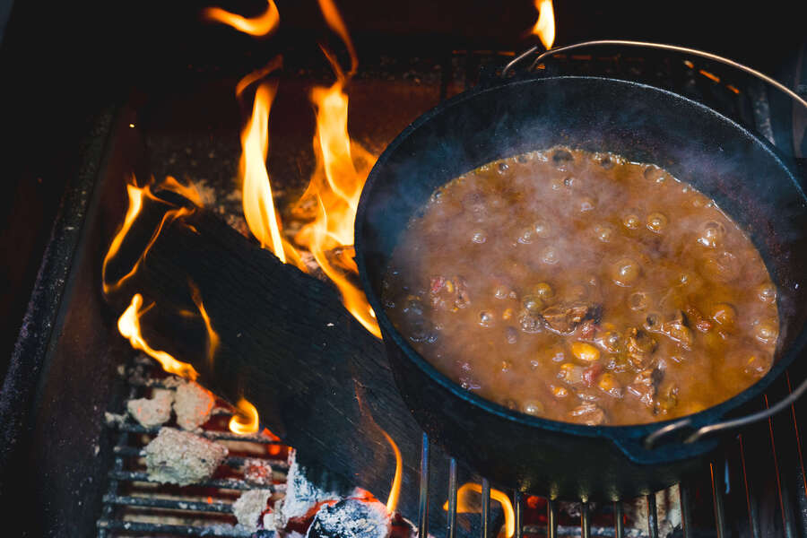 This_image-shows_beef_stew_being_cooked_in_the_cast_iron_cookware