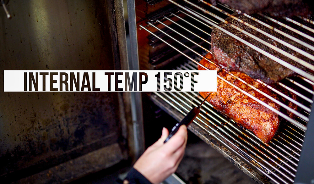 This image shows the temperature of the pork being checked. 