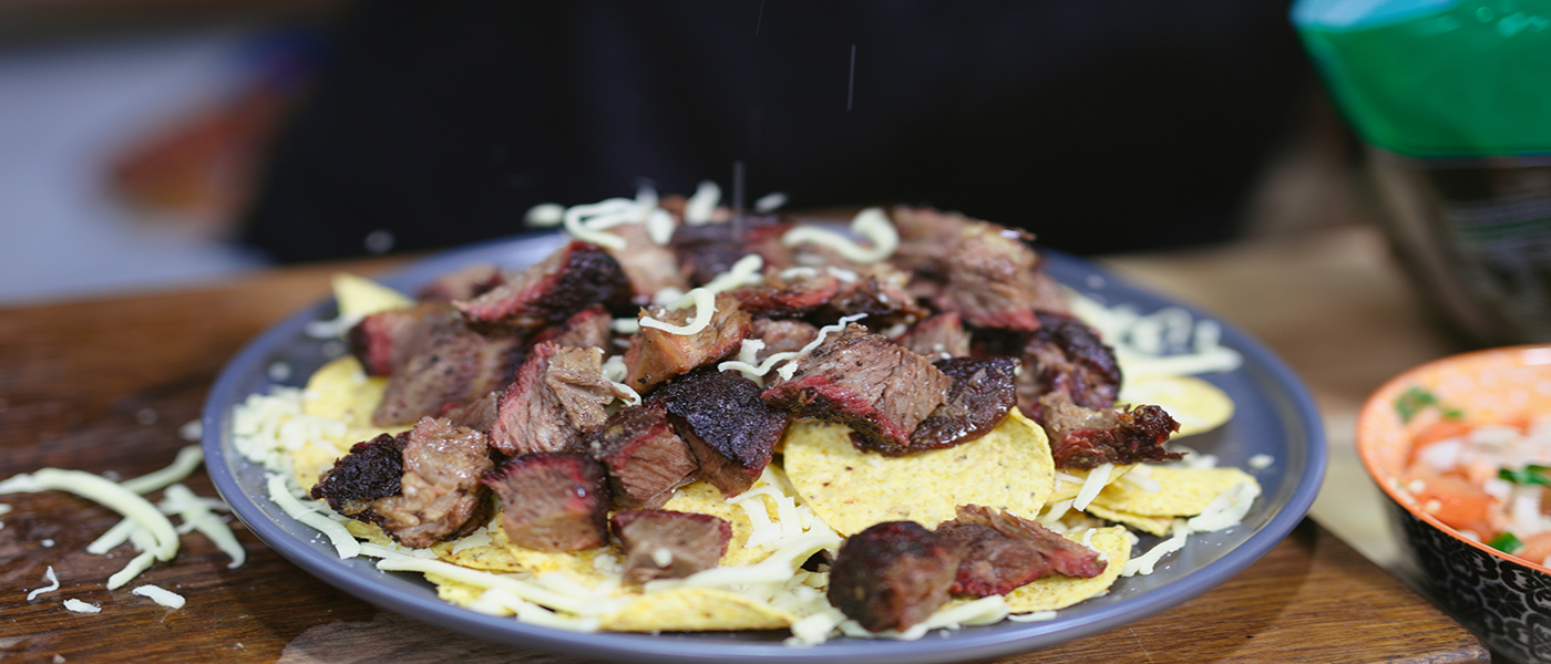 This image shows chips with beef toppings