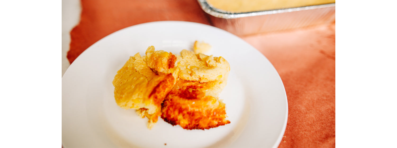 This image shows a corn casserole served in a plate