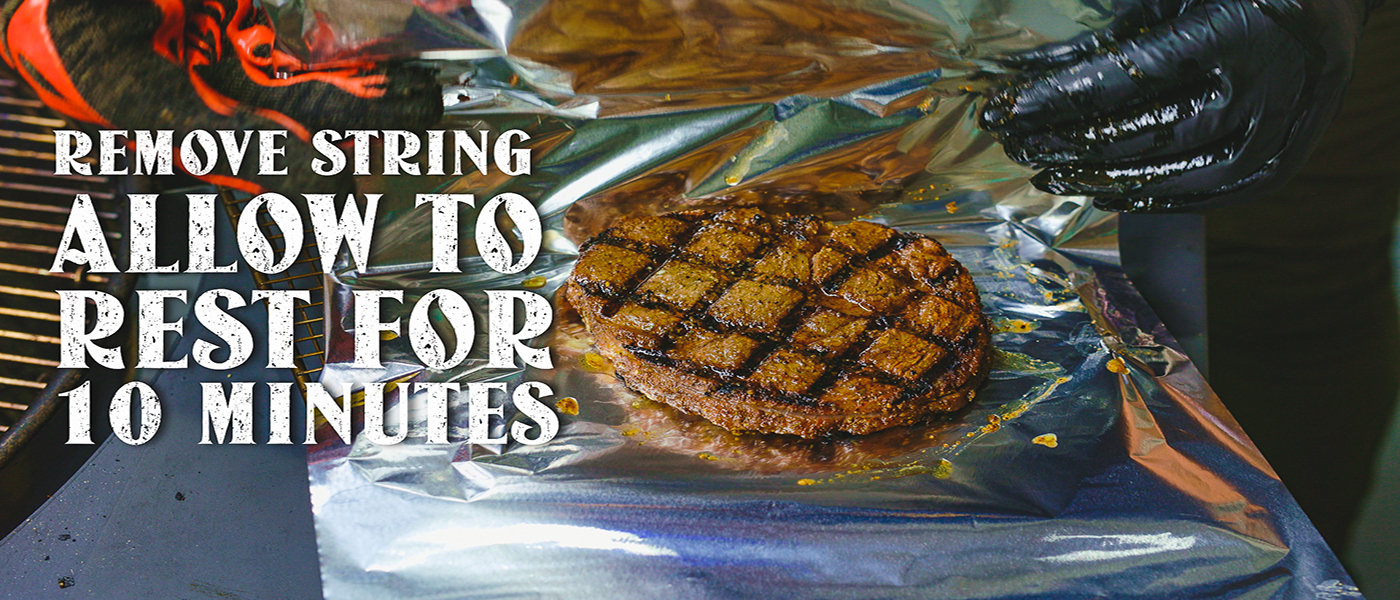 This image shows a steak wrapped in foil