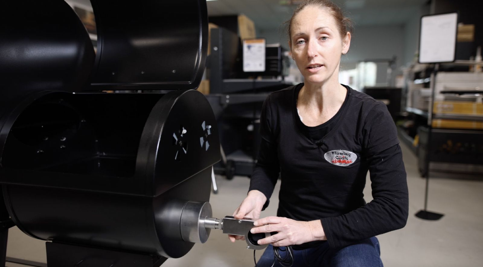 This image shows a woman attaching the fan to the universal adaptor. 