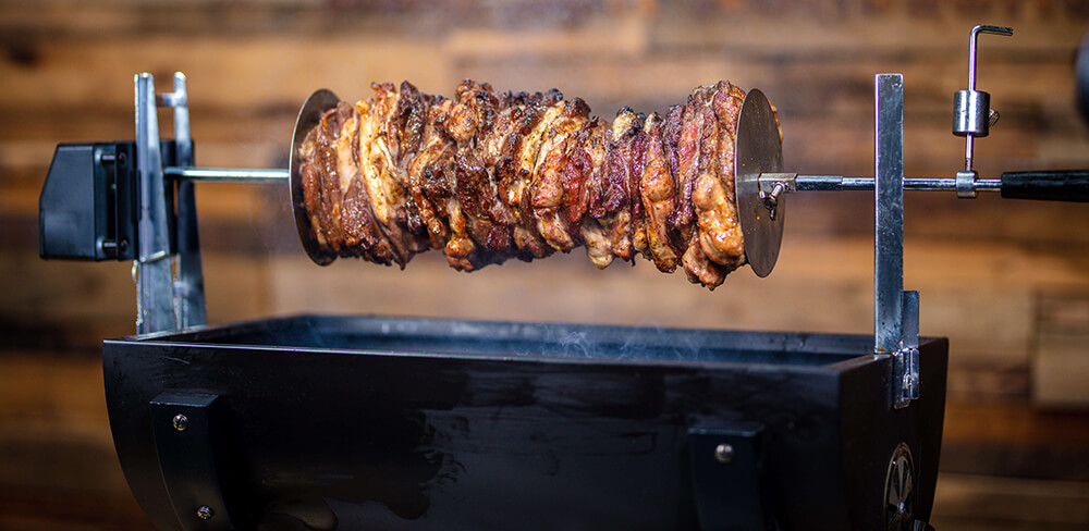 This image shows gyros cooked on a jumbuck mini spit roaster