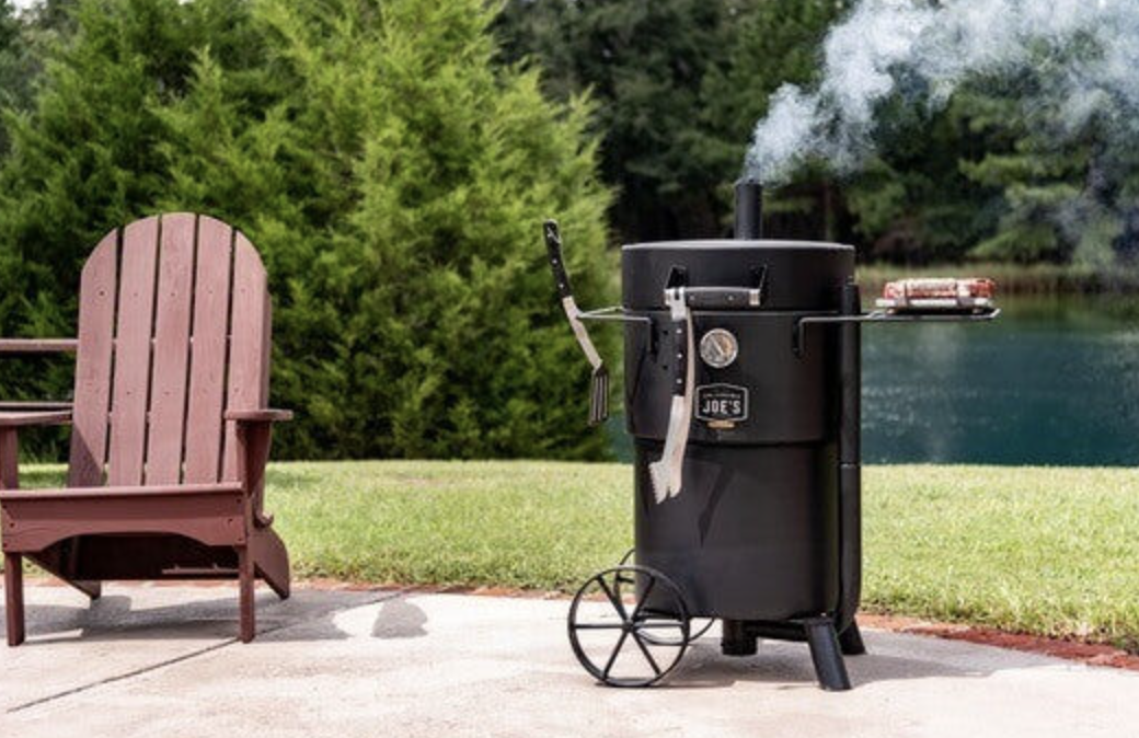 Oklahoma Joe's Bronco Drum Smoke used in a lakeside background