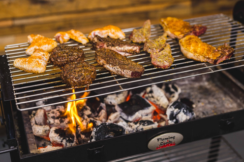 This_image-shows_chicken_and_steaks_being_cooked_on_Cyprus_Grill