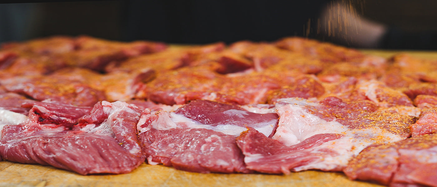 This image shows a lamb shoulder seasoned with Flaming Coals Greek Gyro Seasoning