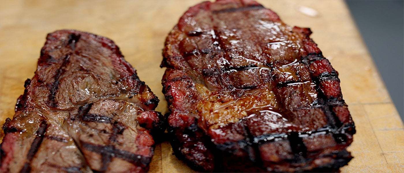 This image shows two chunks of medium rare steak