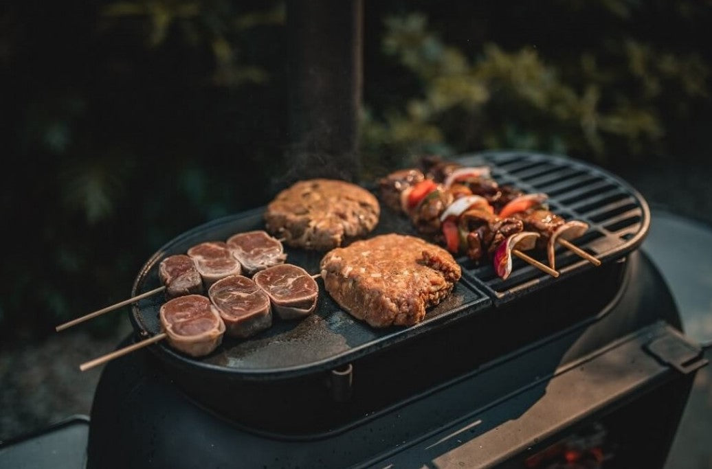 Meat cooking on the Ozpig Big Pig Hotplate