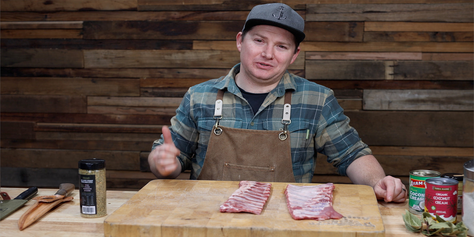 This image shows Tom Spinks showing the pork ribs that he we will be using for today's cook. 