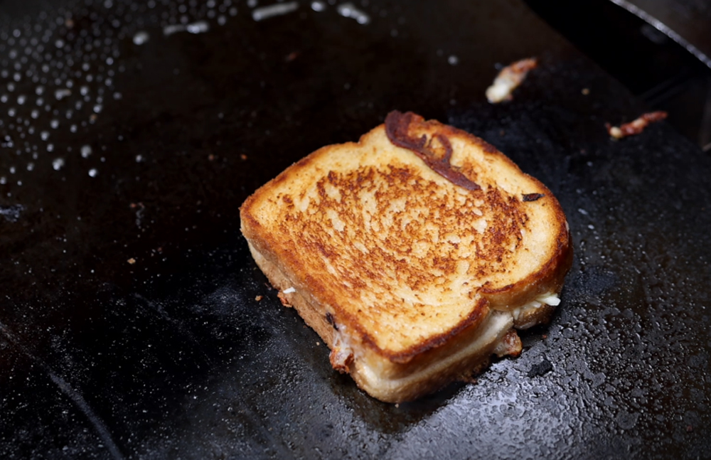 This_image_shows_sandwich_being_grilled_on_SNS_plancha