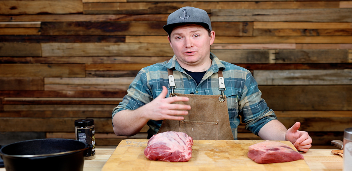 This image shows Tom introducing the scotch fillet that he will be using for cooking steak
